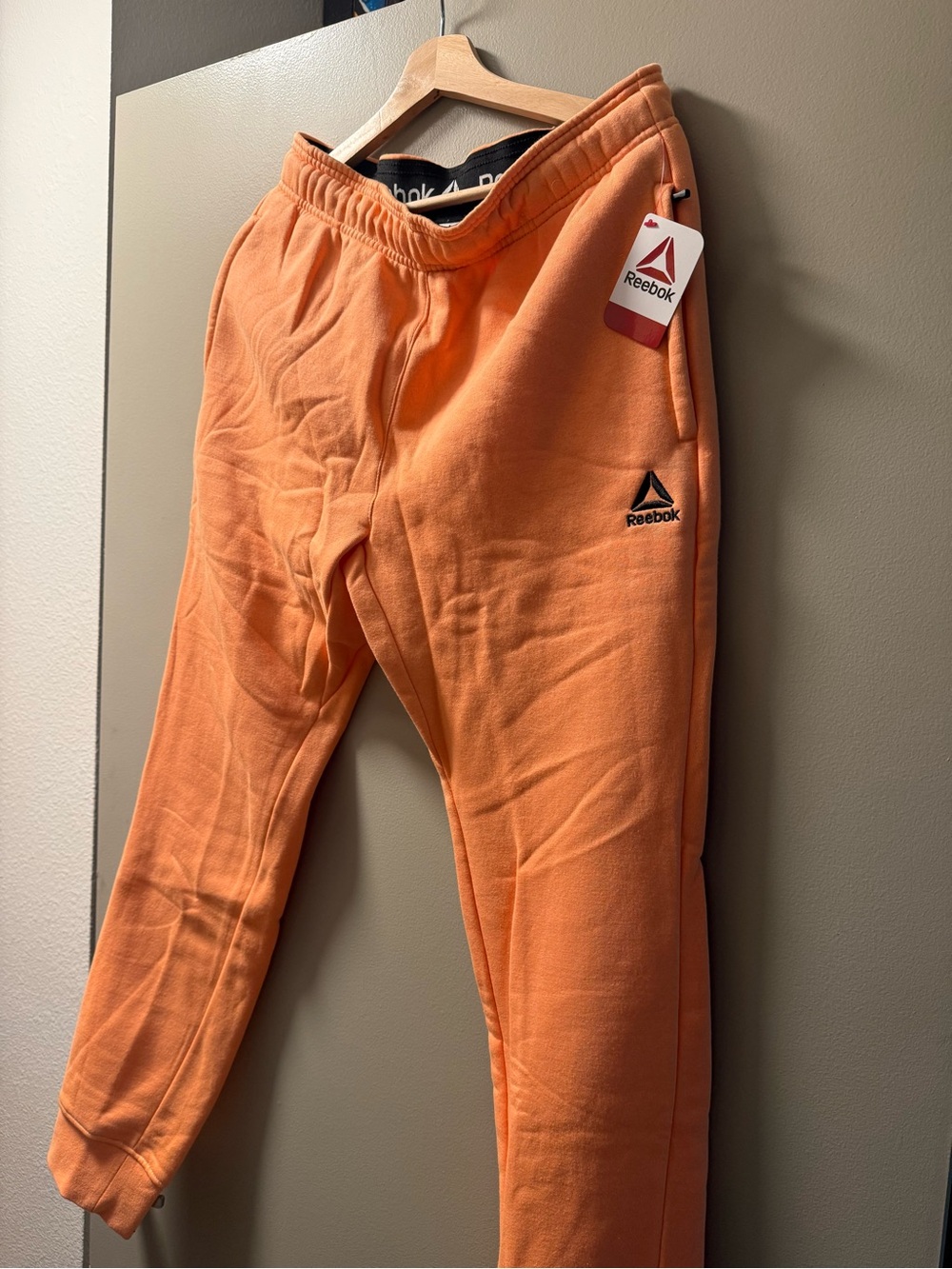 Reebok Orange Fleece Joggers with Logo